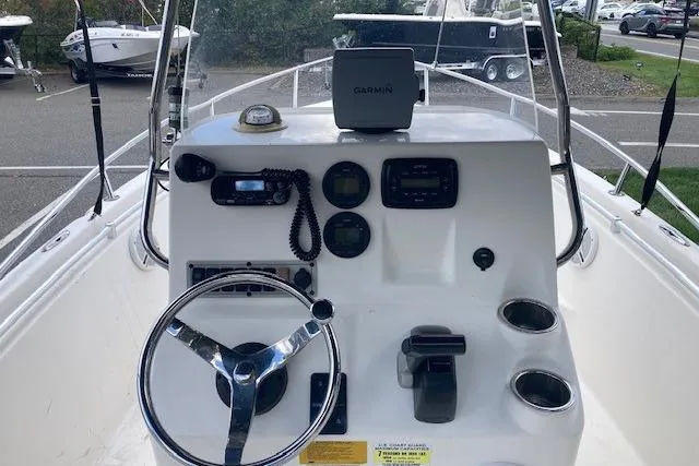 Slide: The Image of 2013 Key West 189 FS boat dashboard with Garmin GPS and steering wheel. - 7