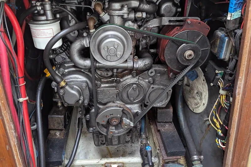 Slide: The Image of 1980 C&C 36 yacht kitchen with stove, double sink, and kettle. - 14