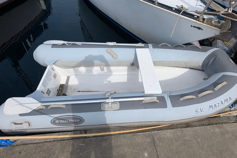 Slide: The Image of Interior of 1980 C&C 36 sailboat with kitchen, seating, and TV. - 15