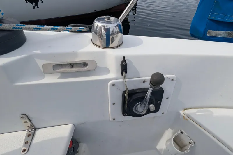 Slide: The Image of Engine compartment of a 1980 C&C 36 sailboat, showing detailed mechanical components. - 17