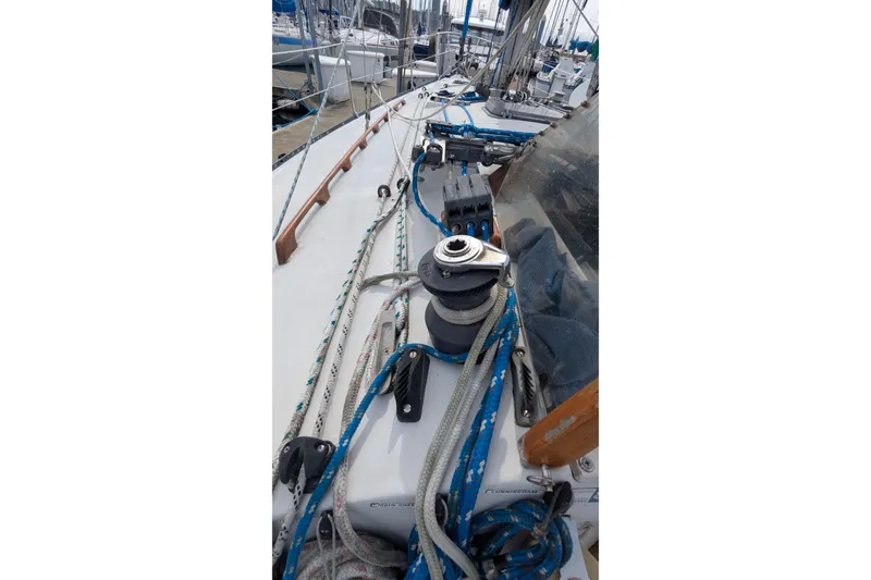 Slide: The Image of Deck of a 1980 C&C 36 sailboat with rigging and ropes. - 22