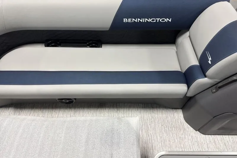 Slide: The Image of 2026 Bennington 23 SSRSF boat interior with blue and gray seating. - 19