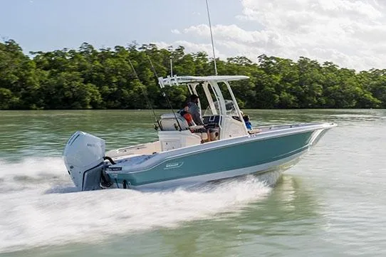 The Image of Manufacturer Provided Image: 2026 Boston Whaler 250 Dauntless cruising on a calm, scenic waterway. - 0