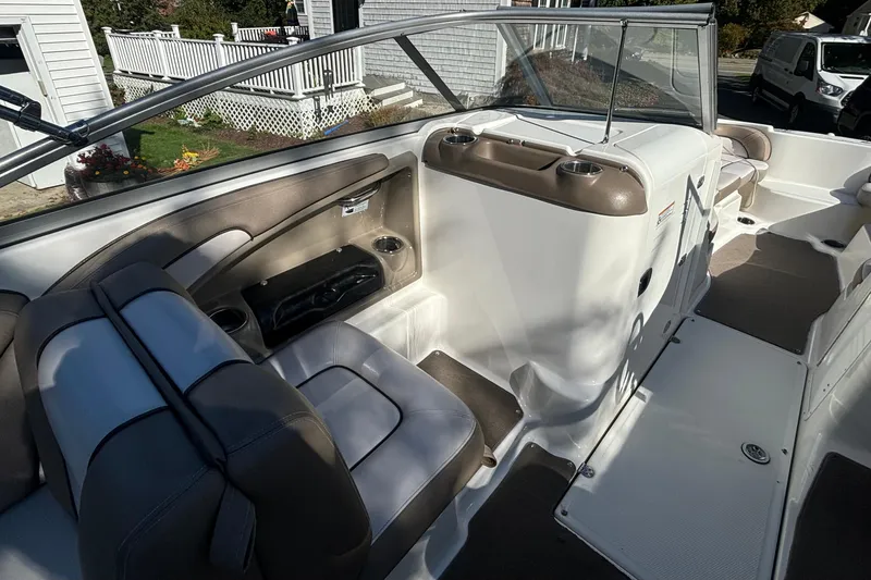 Slide: The Image of 2012 Yamaha Boats AR240 HO interior with seating and dashboard view. - 10