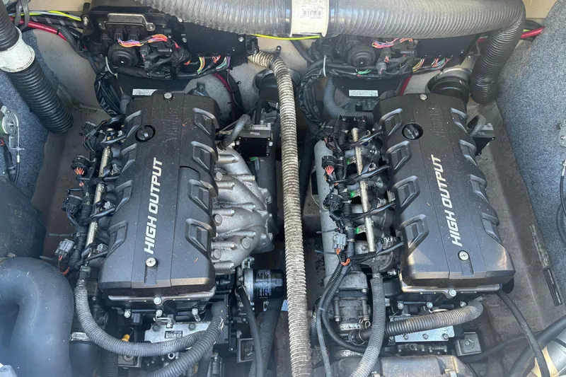 Slide: The Image of 2012 Yamaha Boats AR240 HO engine compartment with dual high-output engines. - 12