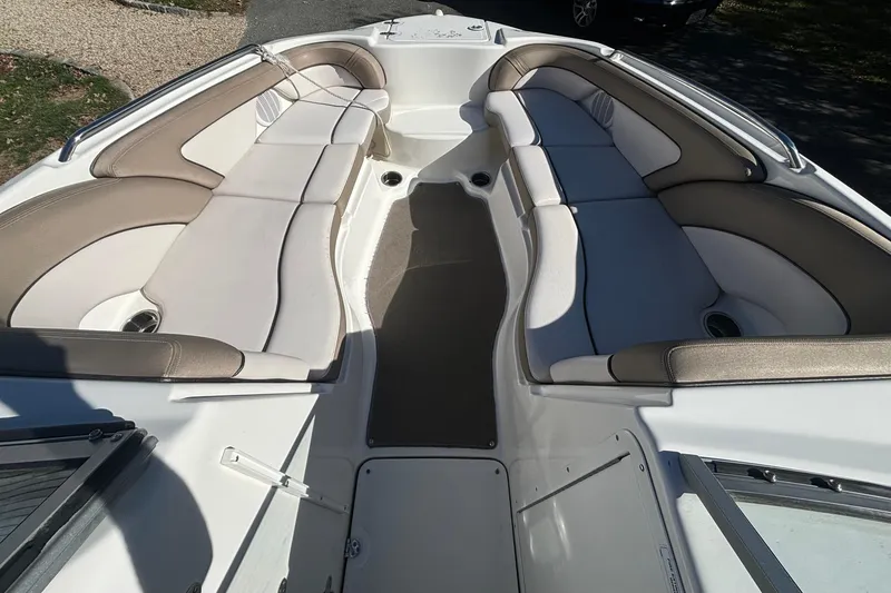 Slide: The Image of 2012 Yamaha Boats AR240 HO interior with spacious seating and sleek design. - 8