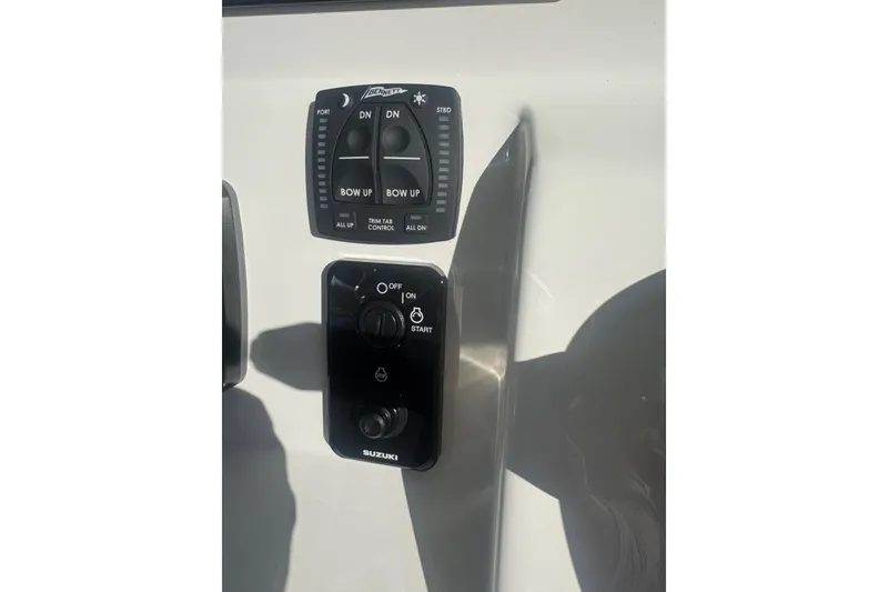 Slide: The Image of Control panel of 2026 Pioneer 222 Islander boat with Suzuki engine controls. - 17