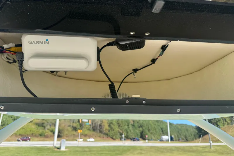 Slide: The Image of Interior view of 2026 Pioneer 222 Islander boat with Garmin electronics installed. - 21