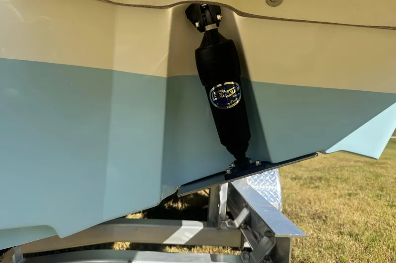 Slide: The Image of 2026 Pioneer 222 Islander boat with Bennett trim tab on trailer. - 29