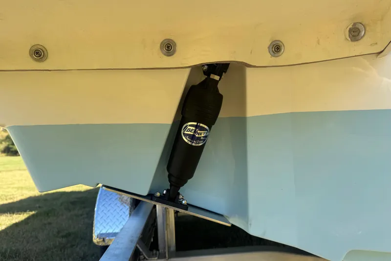 Slide: The Image of 2026 Pioneer 222 Islander boat with trim tab actuator detail. - 30
