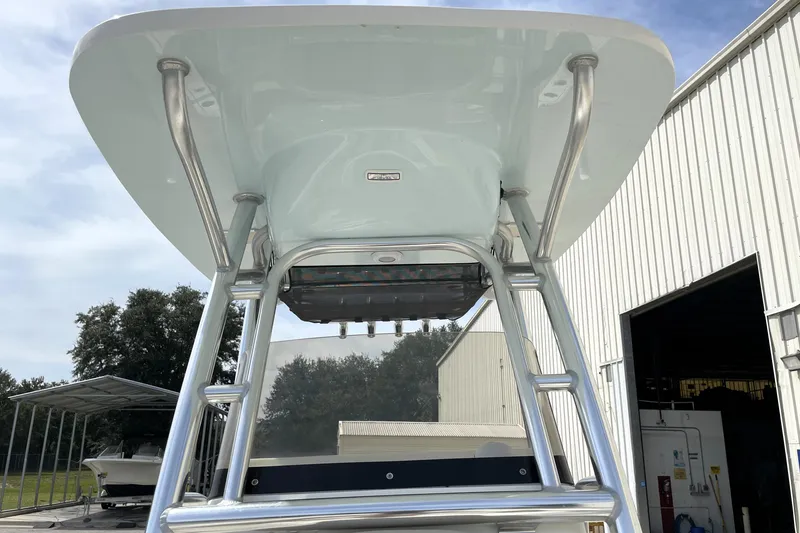 Slide: The Image of 2024 Key West 239 FS boat T-top and ladder, outdoor view. - 20