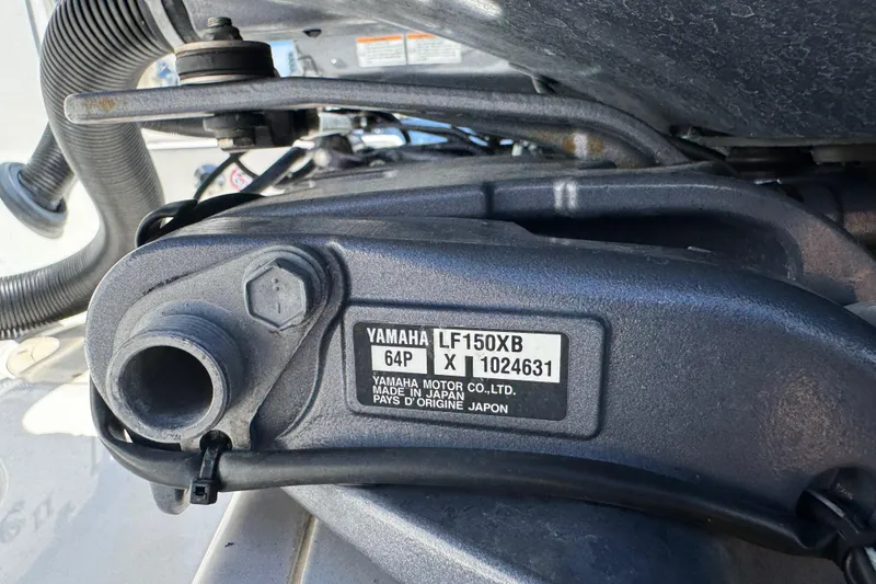 Slide: The Image of Close-up of Yamaha LF150XB engine on 2022 Robalo R242 Center Console boat. - 28