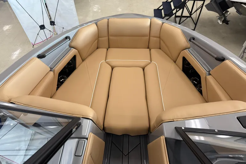 Slide: The Image of 2026 Moomba Craz boat interior with tan leather seating and modern design. - 15