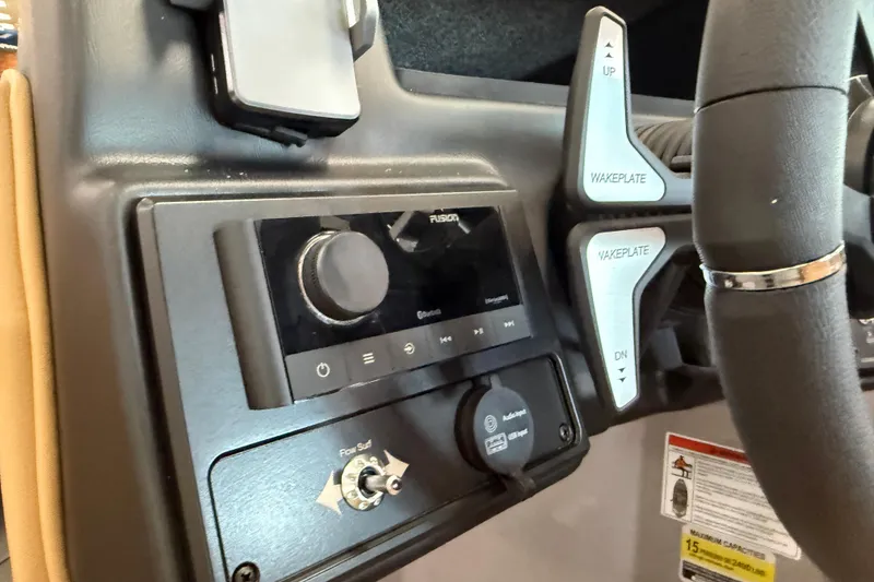 Slide: The Image of 2026 Moomba Craz dashboard with audio controls and wakeplate adjustments. - 22