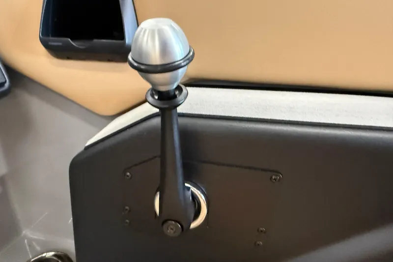 Slide: The Image of 2026 Moomba Craz throttle lever, sleek design, black and silver finish. - 28