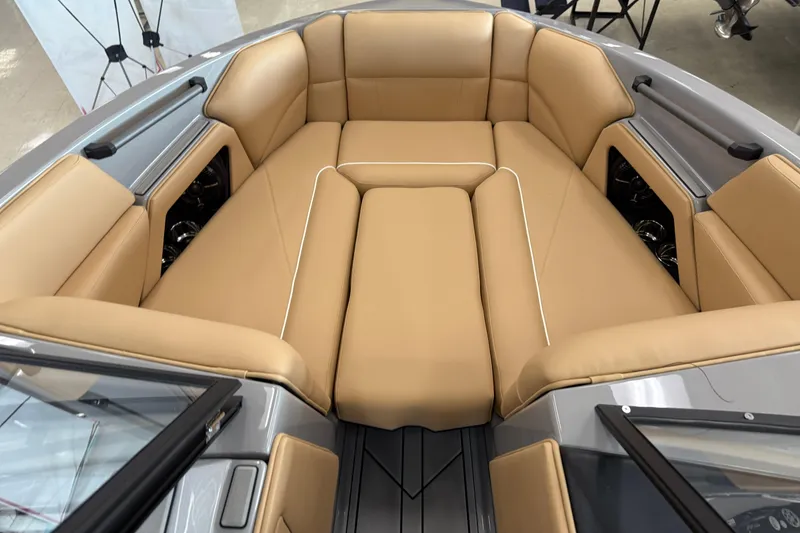 Slide: The Image of 2026 Moomba Craz boat interior with tan leather seating and modern design. - 34