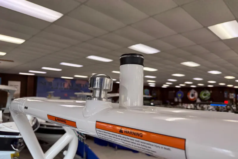 Slide: The Image of 2026 Moomba Craz boat tower with warning label in showroom. - 40