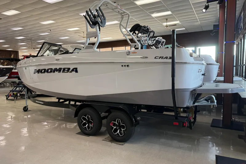 Slide: The Image of 2026 Moomba Craz boat displayed indoors on a trailer. - 6