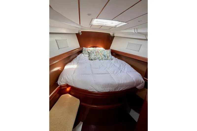 Slide: The Image of Cozy cabin bed in 2006 Beneteau Oceanis Clipper 423 sailboat interior. - 20