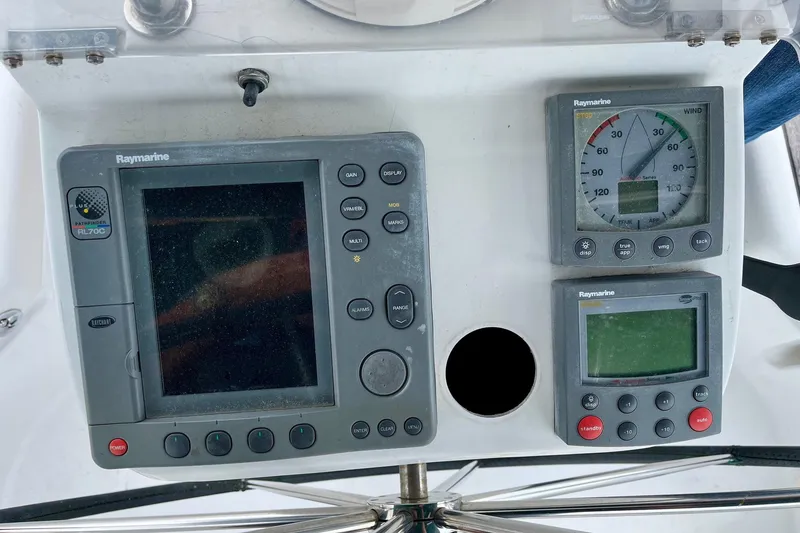 Slide: The Image of Beneteau Oceanis Clipper 423 cockpit with striped cushions, ropes, and winch, 2006 model. - 3