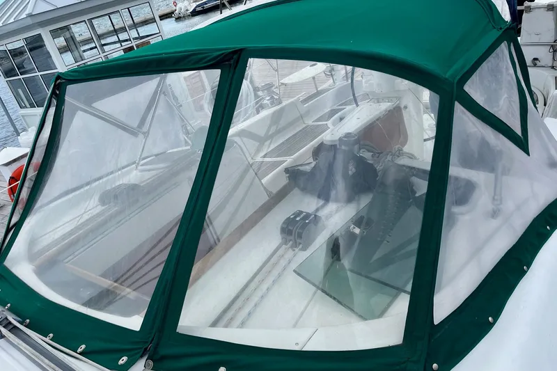 Slide: The Image of Beneteau Oceanis Clipper 423 sailboat docked at marina, 2005 model, calm waters, overcast sky. - 38