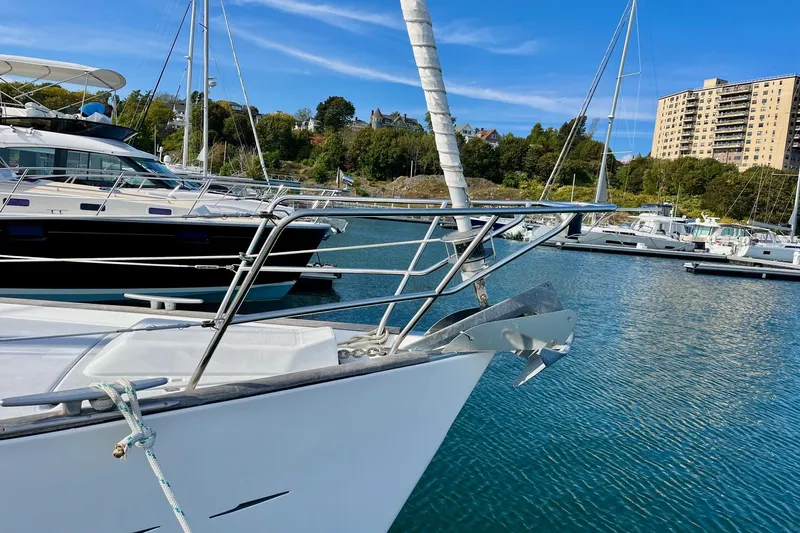 Slide: The Image of Damaged deck of 2006 Beneteau Oceanis Clipper 423 sailboat, showing cracked wood and fiberglass. - 9