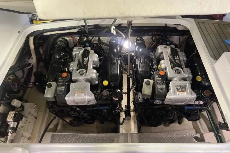 Slide: The Image of Twin engines in a 2015 Formula 350 Crossover Bowrider boat engine compartment. - 9