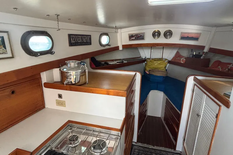 Slide: The Image of Interior of 1985 Jarvis Newman 36 boat with cozy cabin and nautical decor. - 26
