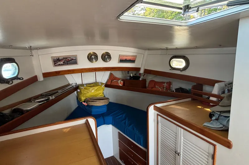 Slide: The Image of Interior of 1985 Jarvis Newman 36 boat with cozy cabin and nautical decor. - 28