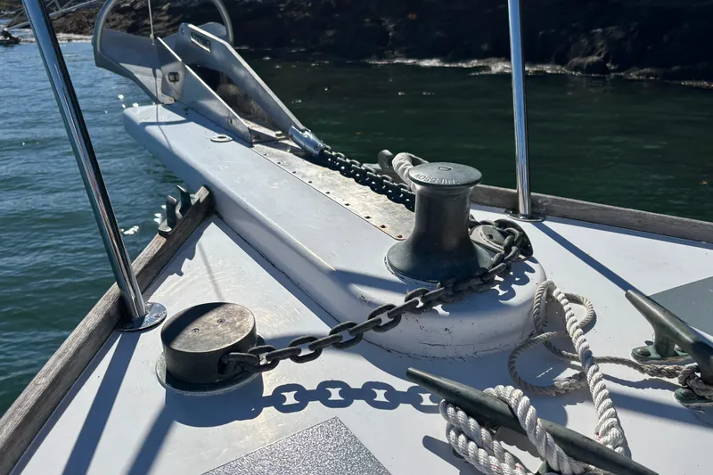 Slide: The Image of Bow of 1985 Jarvis Newman 36 boat with anchor chain and ropes. - 45