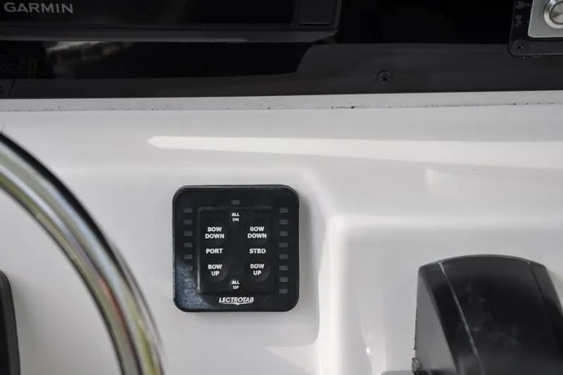 Slide: The Image of Control panel on 2024 Tidewater 2300 Carolina Bay boat dashboard. - 23