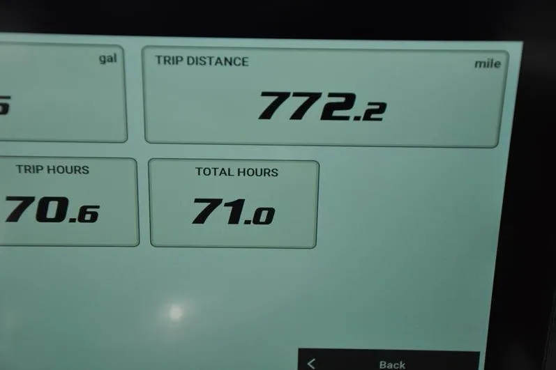 Slide: The Image of Display screen showing trip distance and hours for 2024 Tidewater 2300 Carolina Bay. - 26