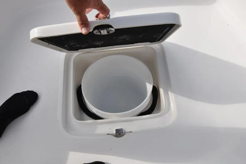 Slide: The Image of Open storage compartment on 2024 Tidewater 2300 Carolina Bay boat. - 31