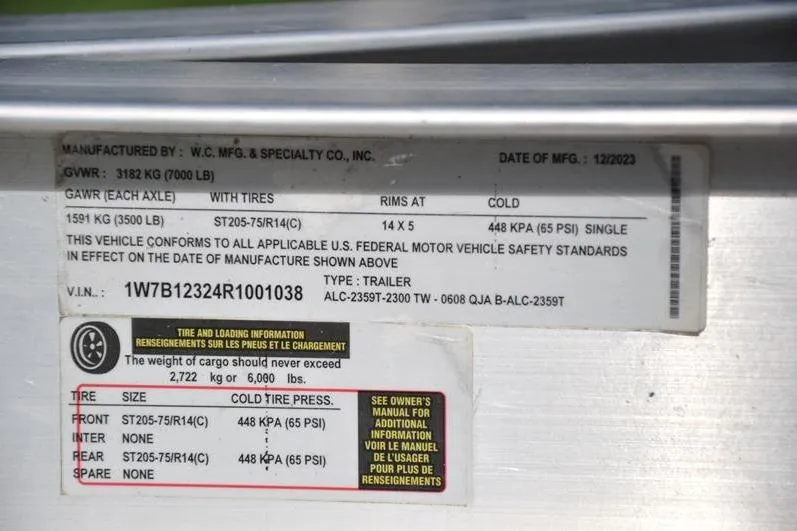 Slide: The Image of 2024 Tidewater 2300 Carolina Bay trailer label with tire and weight specifications. - 41