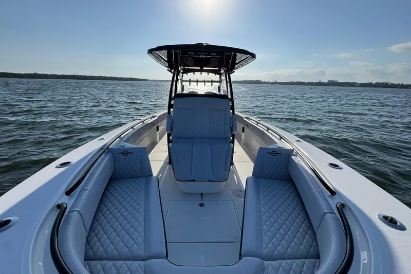 Slide: The Image of 2026 Fountain 34 Tournament Edition boat on open water, featuring luxurious seating and sleek design. - 20