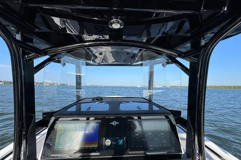 Slide: The Image of Interior view of 2026 Fountain 34 Tournament Edition boat with advanced navigation system. - 28