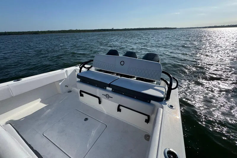 Slide: The Image of 2026 Fountain 34 Tournament Edition boat on open water, featuring sleek seating and modern design. - 35