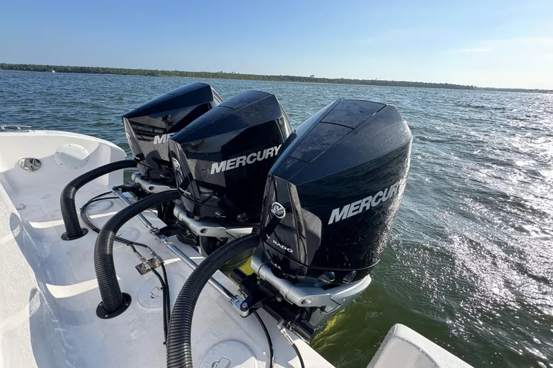 Slide: The Image of Triple Mercury outboard engines on a 2026 Fountain 34 Tournament Edition boat. - 37