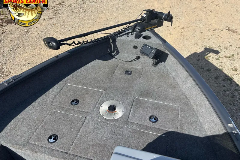 Slide: The Image of 2014 Tracker Pro Guide V-16 SC boat deck with trolling motor and fish finder. - 7