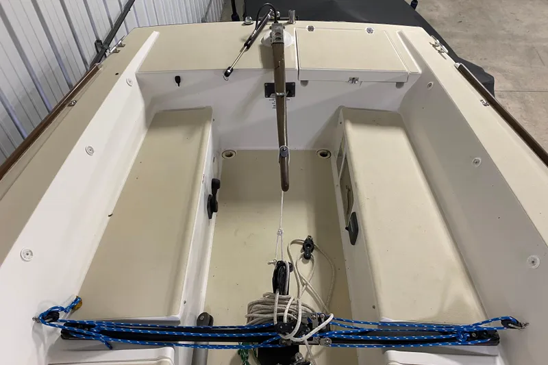 Slide: The Image of 2014 J Boats J/100 sailboat cockpit with seating and rigging. - 12