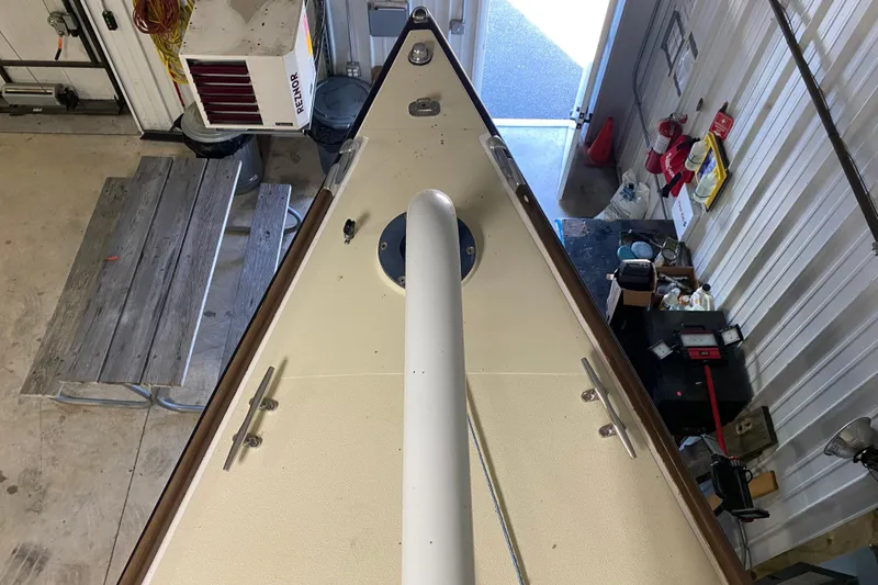 Slide: The Image of Overhead view of 2014 J Boats J/100 sailboat bow in a workshop. - 17