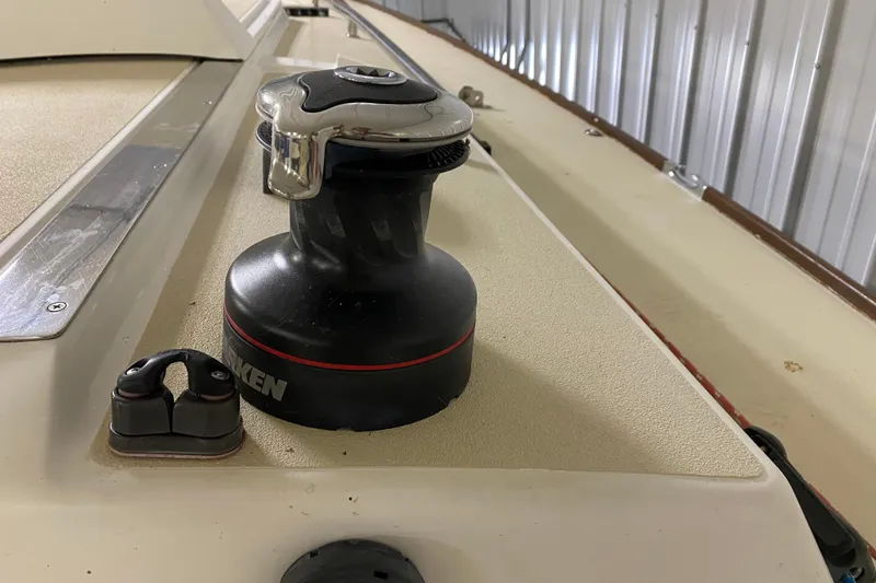 Slide: The Image of Close-up of a 2014 J Boats J/100 winch on deck, featuring Harken equipment. - 21