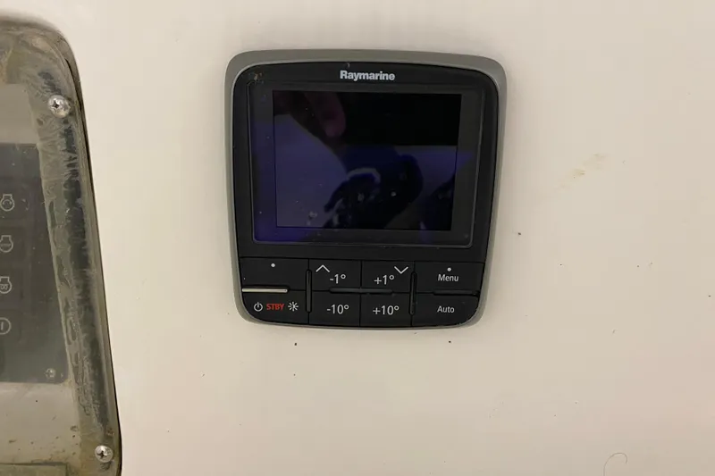 Slide: The Image of Raymarine control panel on 2014 J Boats J/100 yacht dashboard. - 25