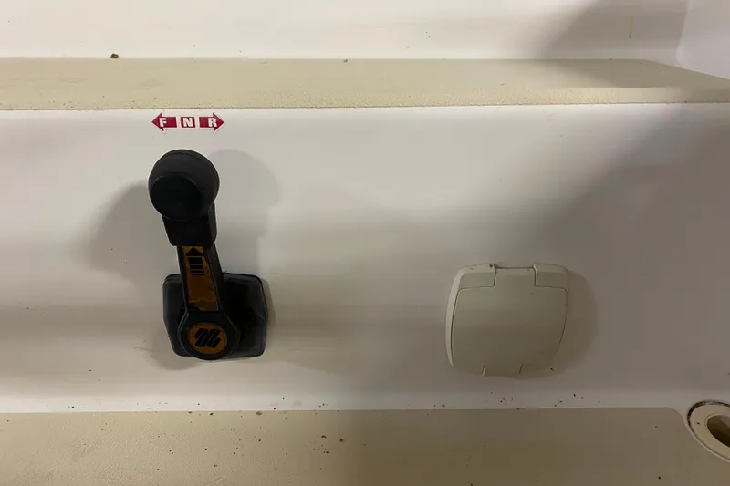 Slide: The Image of Control lever on a 2014 J Boats J/100 sailboat dashboard. - 28