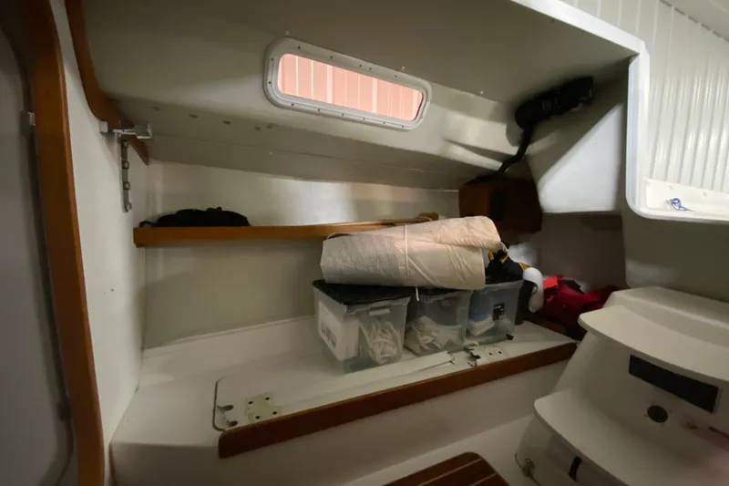 Slide: The Image of Interior cabin of 2014 J Boats J/100 sailboat with storage and equipment. - 30