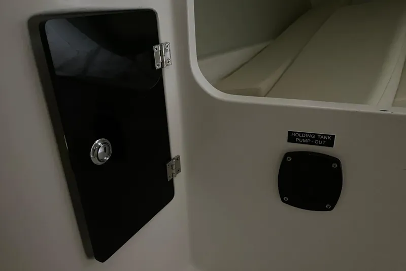 Slide: The Image of Interior of 2014 J Boats J/100 showing holding tank pump-out access. - 33