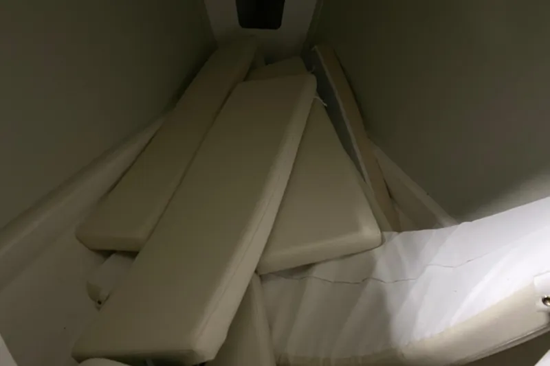 Slide: The Image of Interior view of 2014 J Boats J/100 sailboat with stacked cushions. - 34