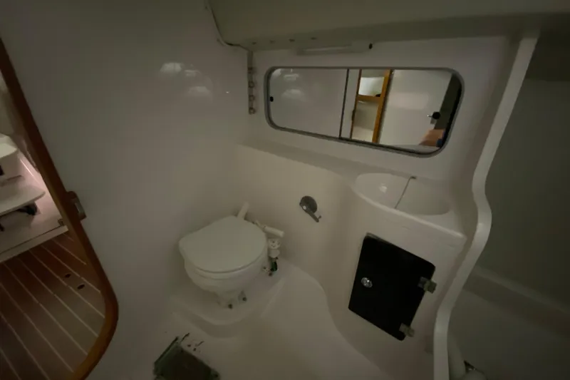 Slide: The Image of 2014 J Boats J/100 yacht bathroom interior with toilet and sink. - 35