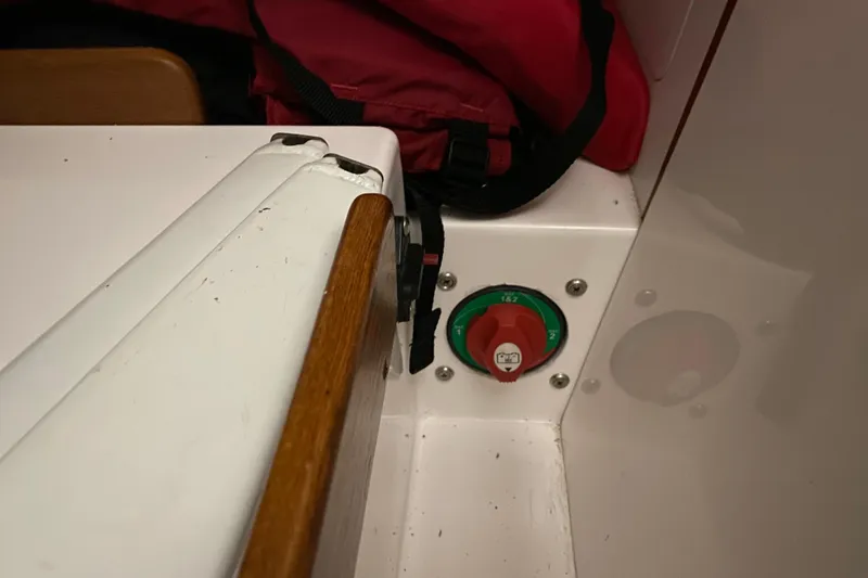 Slide: The Image of 2014 J Boats J/100 interior with red switch and wooden trim. - 41