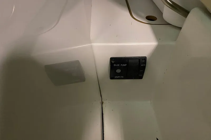 Slide: The Image of Bilge pump control panel on 2014 J Boats J/100 sailboat interior. - 42